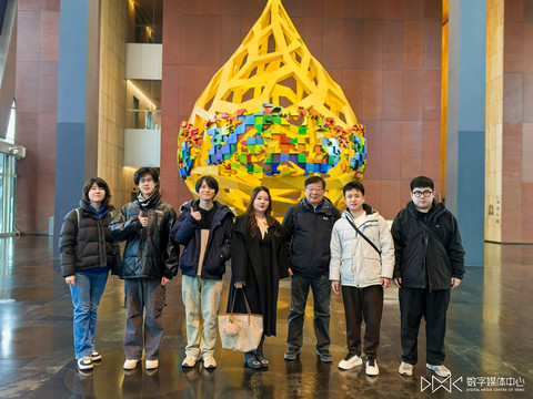 师生团队在央视新楼合影.jpg